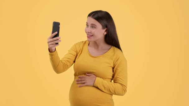 Lovely Young Pregnant Woman Video Chatting Friends Smartphone Waving Hand — Stock Video