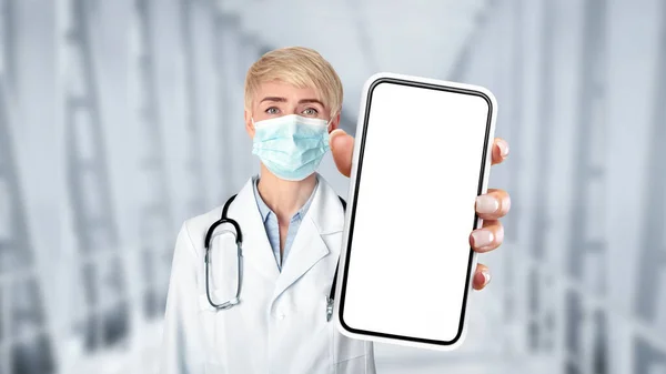 Middle Aged Doctor Woman Medical Mask Showing Blank Smartphone Camera — Photo