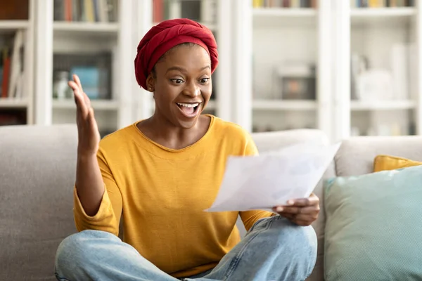 Happy Young African American Woman Sit Couch Home Reading Good — Stock Photo, Image