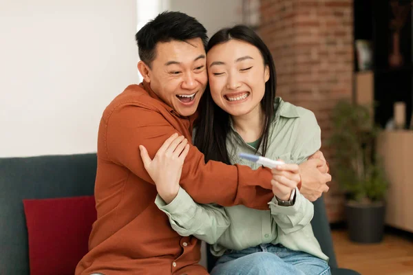 Family Relationships Concept Happy Pregnant Asian Couple Pregnancy Test Hugging — Photo