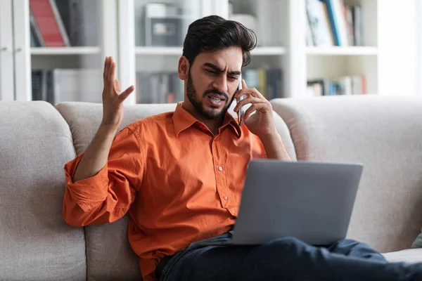 Emotional Angry Middle Eastern Guy Businessman Working Home Sit Couch — Stockfoto