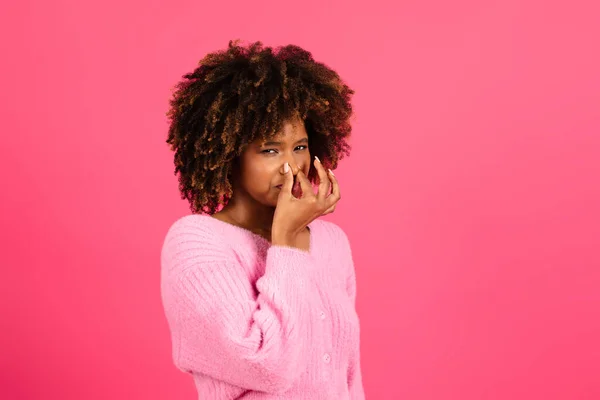 Sad Dissatisfied Upset Young Black Curly Lady Casual Covering Nose — Stok fotoğraf