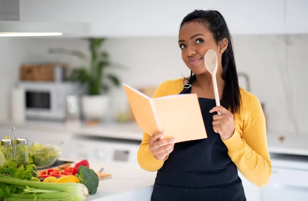 Smiling Pensive Young Black Lady Cook Apron Wooden Spoon Reads — Stock Photo, Image