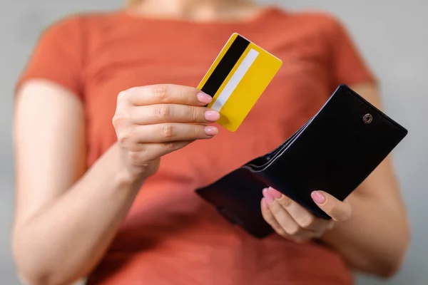 Unrecognizable Woman Taking Out Bank Credit Card Out Of Leather Wallet, Young Female Ready To Make Payment, Closeup Shot Of Millennial Lady Paying For Her Purchases, Low Angle View, Cropped