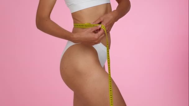 Fit Body Concept Close Shot Young Unrecognizable Slim Woman Measuring — Stockvideo