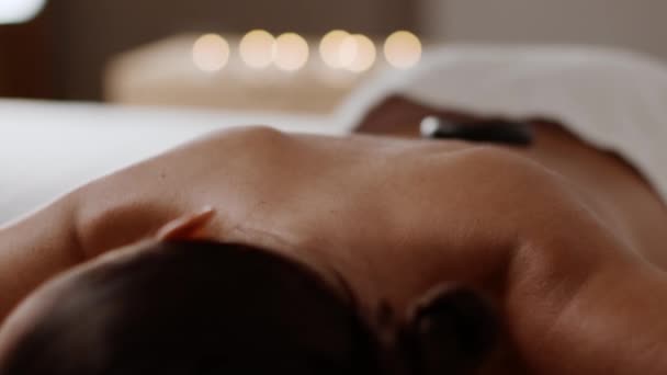 Spa Relaxation Concept Close Shot Professional Masseur Putting Hot Stones — Videoclip de stoc