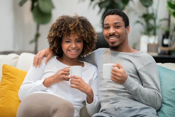 Cute Positive Beautiful African American Couple Homewear Sitting Together Couch — Stockfoto