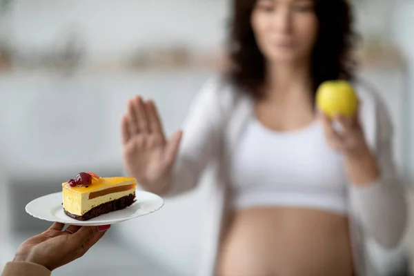 Healthy Eating Pregnancy Young Pregnant Female Refusing Cake Choosing Apple — Zdjęcie stockowe