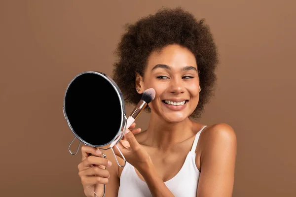 Cheerful Young Multiracial Curly Lady White Top Applies Powder Blush — Photo