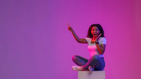Amazing Offer Excited Black Female Sitting Big Cube Neon Light — Foto de Stock