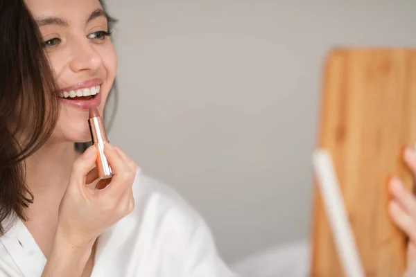 Smiling Caucasian Millennial Woman Applying Lipstick Lips Looking Mirror Enjoy — Stock Photo, Image