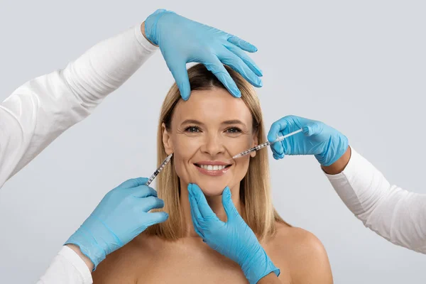 Smiling Attractive Blonde Middle Aged Woman Gets Cosmetic Injection Her — Zdjęcie stockowe