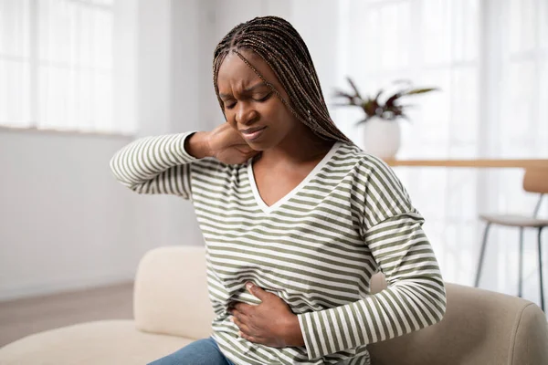 Unhappy Young Black Woman Wearing Casual Clothes Suffering Menstrual Cramps — Stockfoto