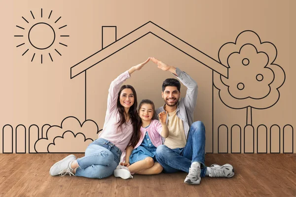Mortgage for young families, collage. Happy middle eastern family moving to their own home. Parents joining hands making symbolic house roof, sitting together over house sketch background