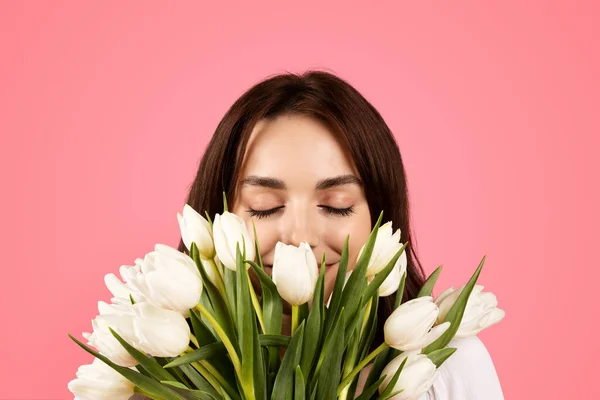 Cheerful Young European Female Closed Eyes Sniffing Bouquet White Tulips — Foto de Stock