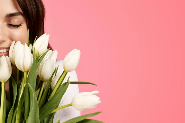 Smiling Young European Lady Closed Eyes Sniffing White Tulips Bouquet — Foto de Stock