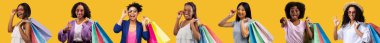 Smiling multiethnic young ladies with bags with purchases show thumb up, ok sign, enjoy shopping isolated on yellow background, studio, panorama. Emotions from sale, recommendation buy, ad and offer