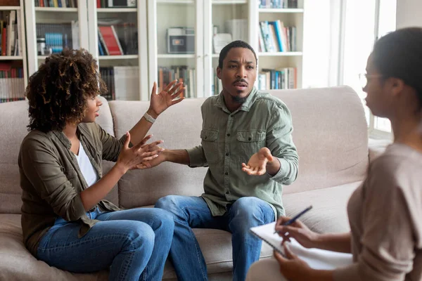 Hysterical Angry Emotional Millennial Black Man Woman Sitting Couch Front — Stockfoto