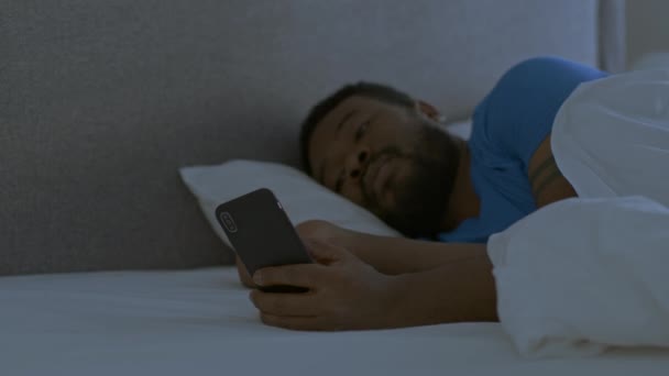 Sleep Disorder Internet Addiction Young African American Guy Web Surfing — Stockvideo
