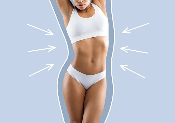 Calm young slim african american lady in white lingerie enjoy weight loss result with abstract body line around, isolated on blue wall background, studio. Liposuction, health, body care, diet and fit