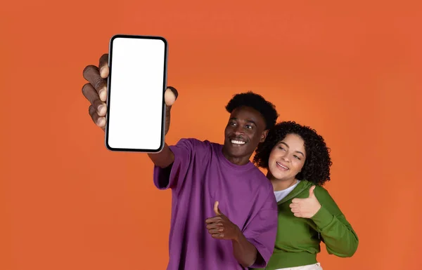 Cute Cheerful Multiracial Young Couple Hipsters Showing Brand New Cell — Stock Photo, Image