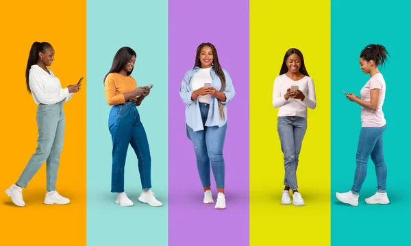 スマートフォンでカジュアルな入力で幸せな若い黒人女性は リモートでチャット カラフルな背景 スタジオ パノラマに孤立した ライフスタイル オンラインコミュニケーション ソーシャルネットワークのためのガジェット ブログのためのアプリ — ストック写真