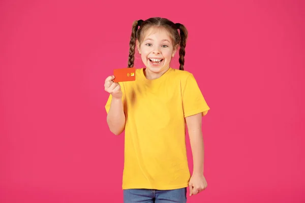 Cheerful Cute Little Girl Holding Credit Card Hand Looking Camera — Stock Photo, Image