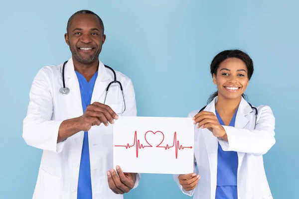 African American Female Male Doctors Holding Paper Drawing Heart Rate — Stock Photo, Image