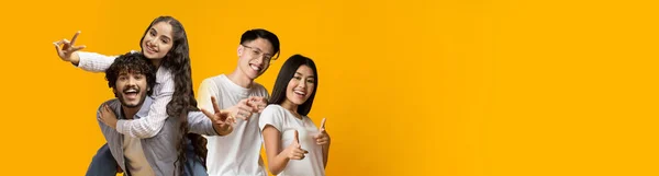 Positive Millennial Asian Indian Couples Having Fun Yellow Studio Background — Stock Photo, Image
