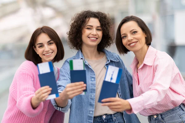 Three Happy Women Posing Passports Tickets Hands Airport Cheerful Young — Stock Photo, Image