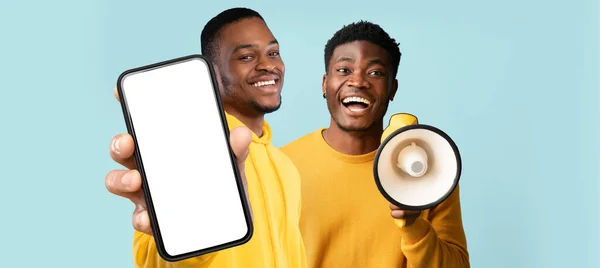 Penawaran Ponsel Two Black Male Demonstrating Big Blank Smartphone Using — Stok Foto