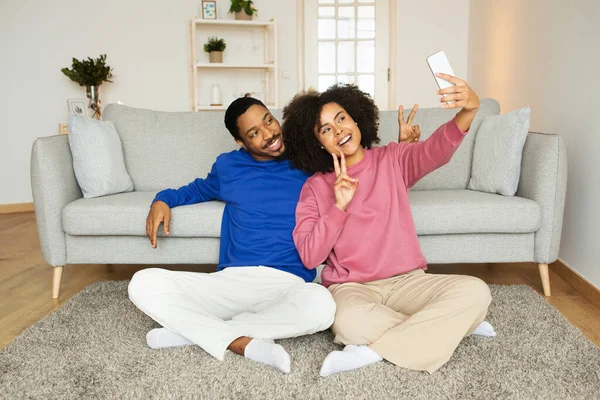 Happy Black Spouses Making Selfie Smartphone Posing Hugging Gesturing Victory —  Fotos de Stock