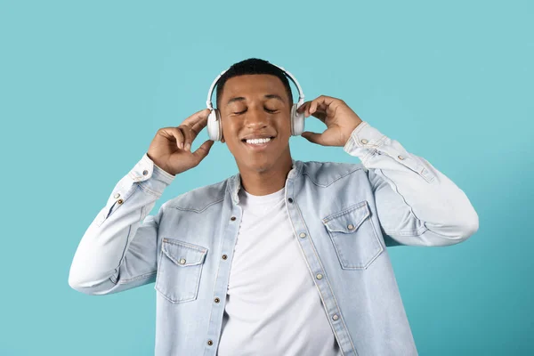 Satisfied Millennial Black Guy Wireless Headphones Closed Eyes Listen Music — Stock Photo, Image