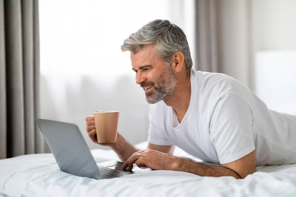 Relaxed Cheerful Happy Handsome Mature Grey Haired Man Lying Bed — Stock Photo, Image