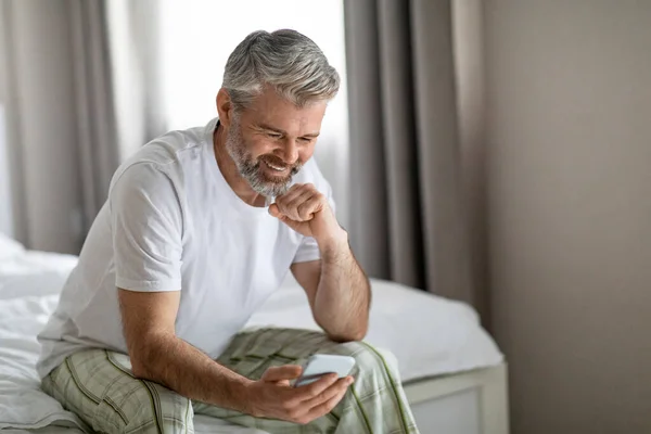 Cheery Happy Handsome Grey Haired Bearded Mature Man Wearing Pajamas — Stock Photo, Image
