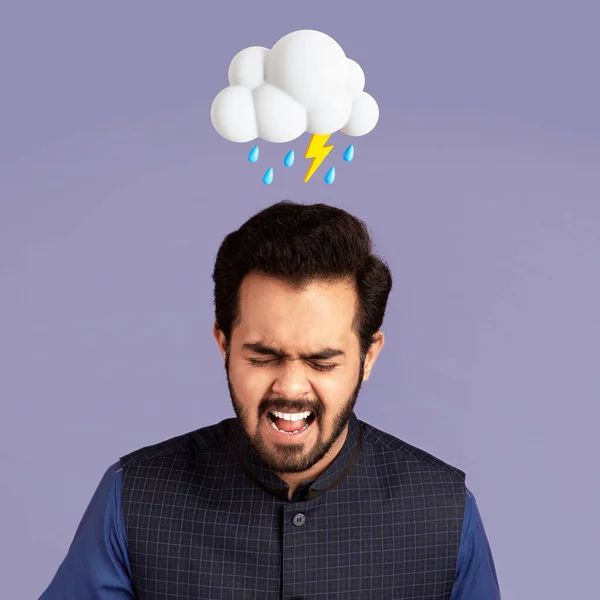 Despaired sad young hindu guy screaming suffer from pain, migraine with abstract cloud of lightning and rain sign above head isolated on violet studio background. Bad mood, ill and stress