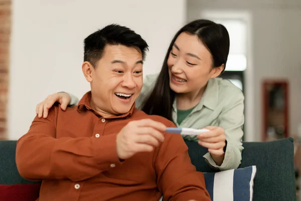 Happy Asian Middle Aged Husband Young Wife Rejoicing Positive Pregnancy — Stock Photo, Image