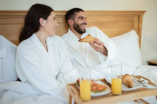 Breakfast Bed Cheerful Spouses Eating Enjoying Fresh Pastry Juice Sitting — Stock Photo, Image
