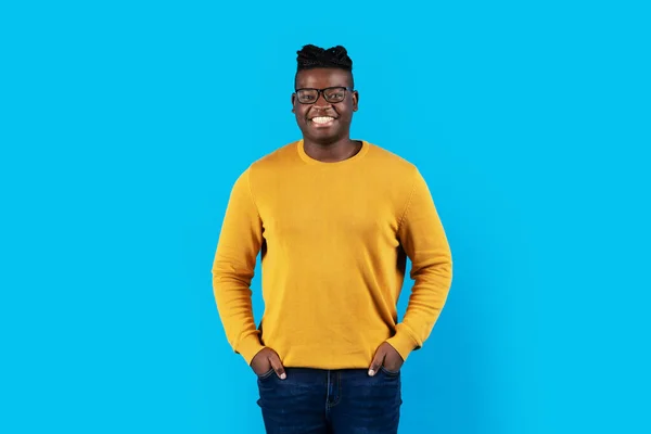 Smiling Young Black Man Wearing Stylish Eyeglasses Posing Blue Studio — Stock Photo, Image