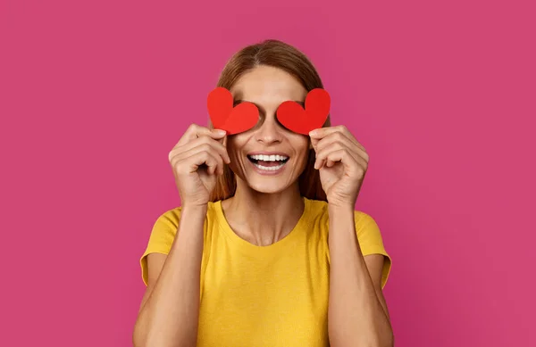 Laughing Funny Middle Aged European Blonde Lady Puts Hearts Her — Stock Photo, Image