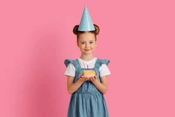 Happy Little Girl Party Hat Holding Piece Birthday Cake Met — Stockfoto