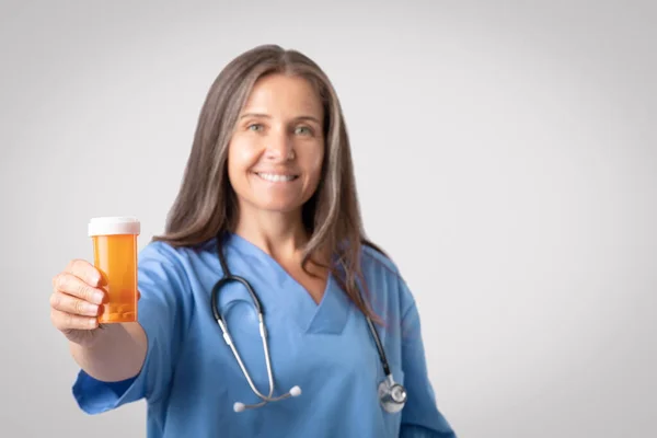 Treatment Pills Happy Senior Doctor Woman Uniform Showing Jar Medicines — Stock Photo, Image