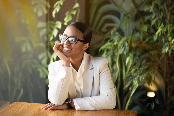 Glad Pensive Young Black Lady White Suit Glasses Smart Watch — Stock Photo, Image