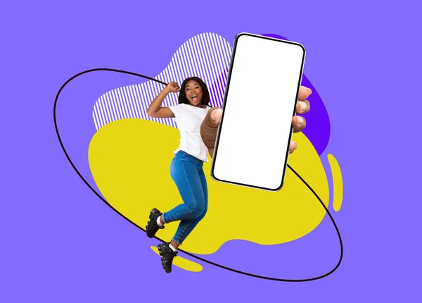 Happy Black Lady Holding Blank Smartphone And Celebrating Success While Jumping On Abstract Background With Colorful Splashes, Excited Woman Advertising Modern Mobile App, Collage, Mockup