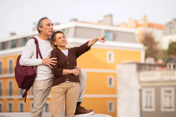 Sightseeing Lisbon Senior Tourists Couple Standing European City Posing Backpack — Stock Photo, Image
