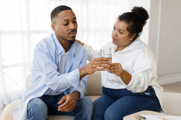 Friendly Young Hispanic Woman Size Counselor Giving Upset Black Man — Stock Photo, Image