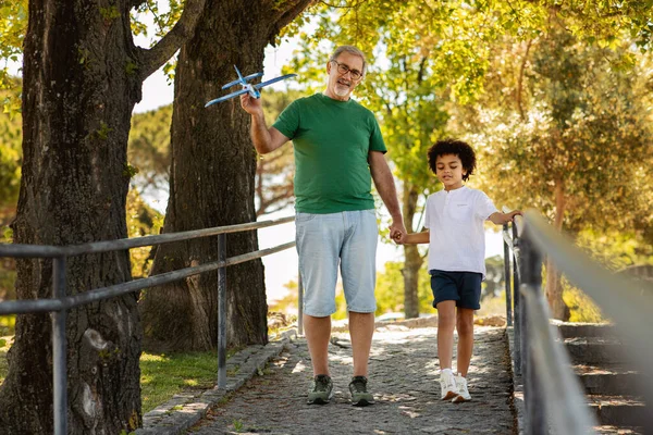 Glad Little Mixed Race Kid Old Caucasian Grandfather Enjoy Free — Stock Photo, Image