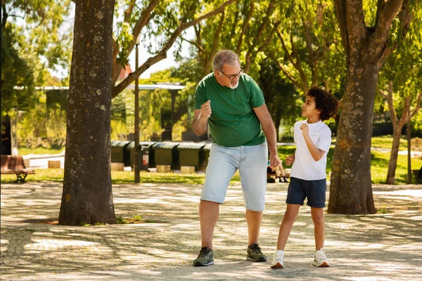 Cheerful Little Mixed Race Boy Old Caucasian Grandfather Enjoy Free — Stock Photo, Image