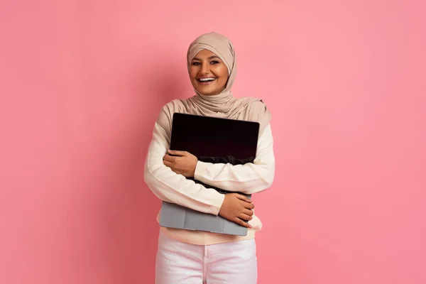 Cheerful Young Muslim Female Hijab Hugging Opened Laptop Blank Screen — Stock Photo, Image