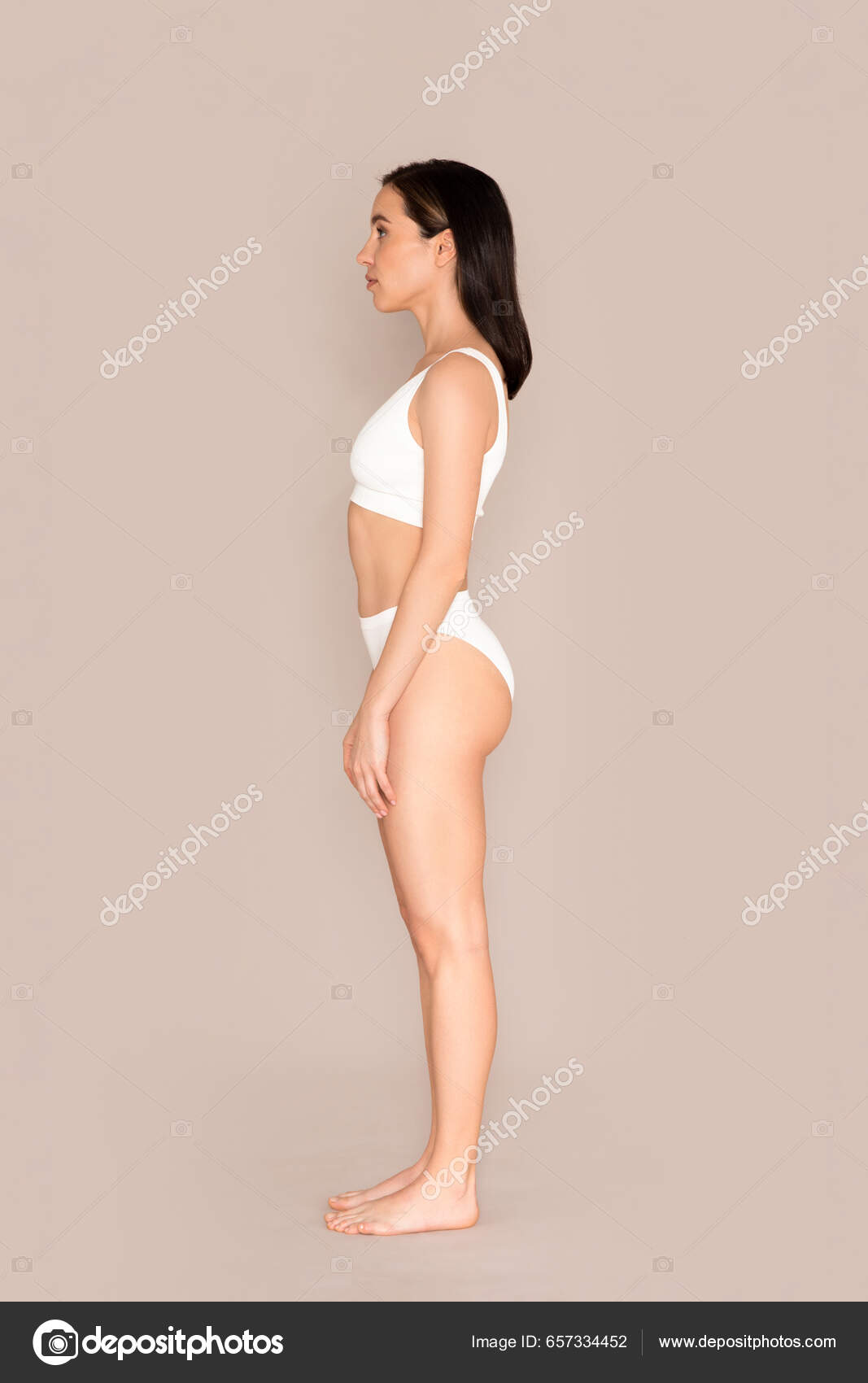 Side View Young Slim Woman Beautiful Perfect Body Posing Beige Stock Photo  by ©Milkos 657334452